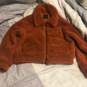 UO CROPPED TEDDY JACKET medium orange